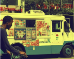 "Ice Cream Truck and Cyclist"